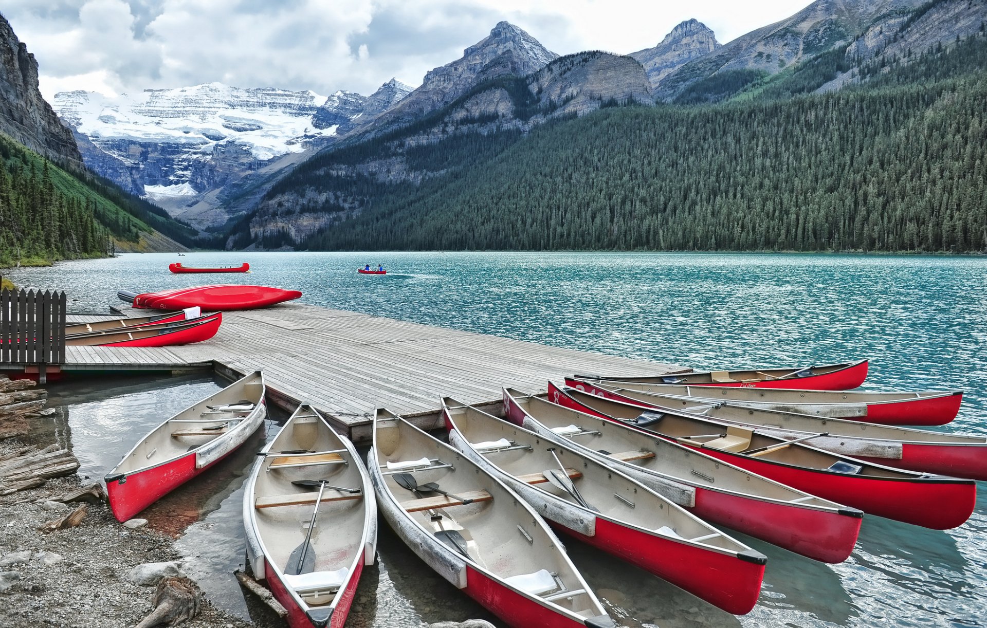 lake louise alberta canada marina mountains canoe