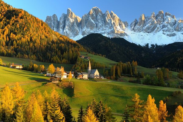 Beautiful landscape of the house on the background of mountains