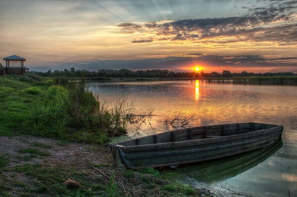 Boat sky grass sun