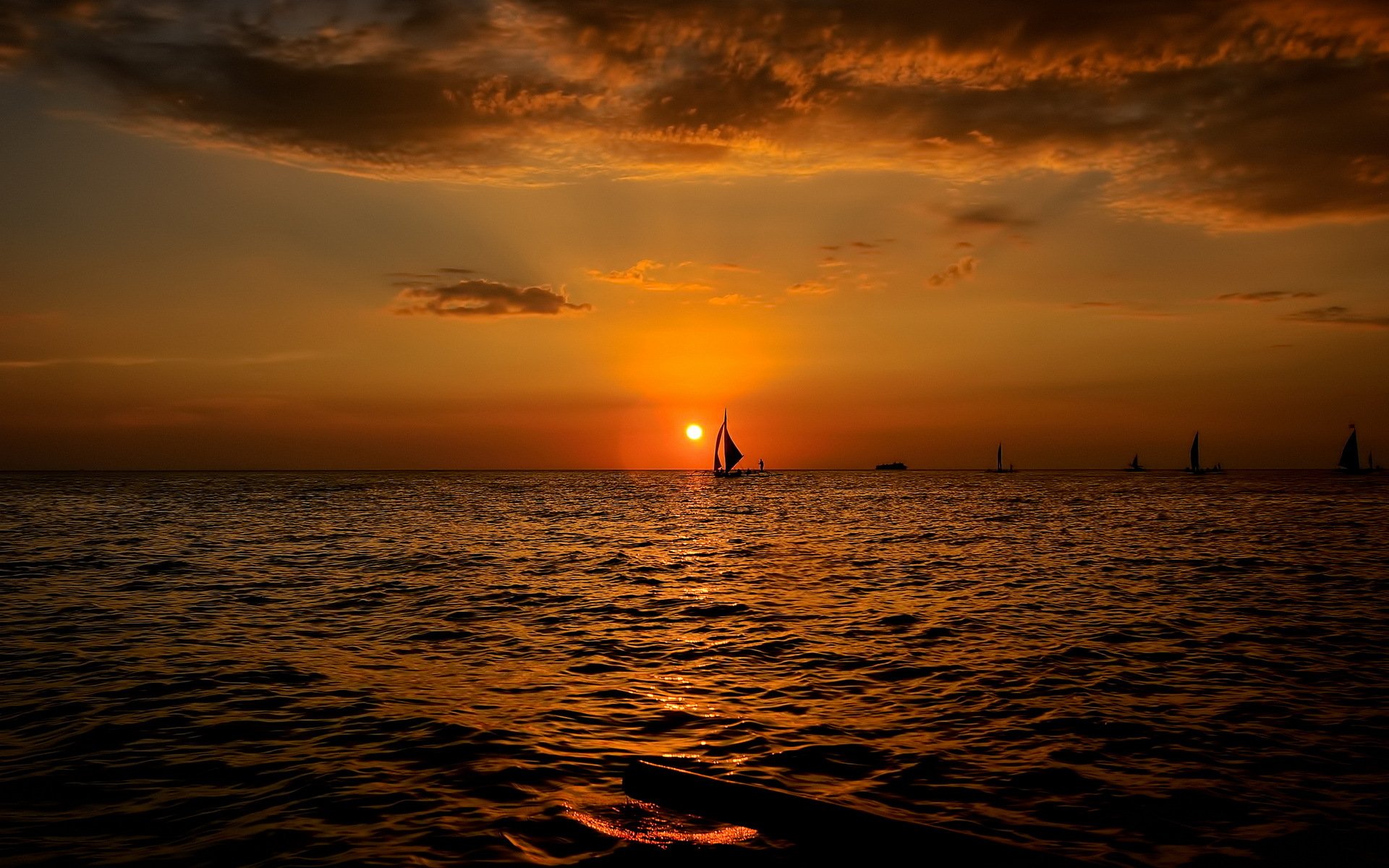 puesta de sol mar barcos paisaje