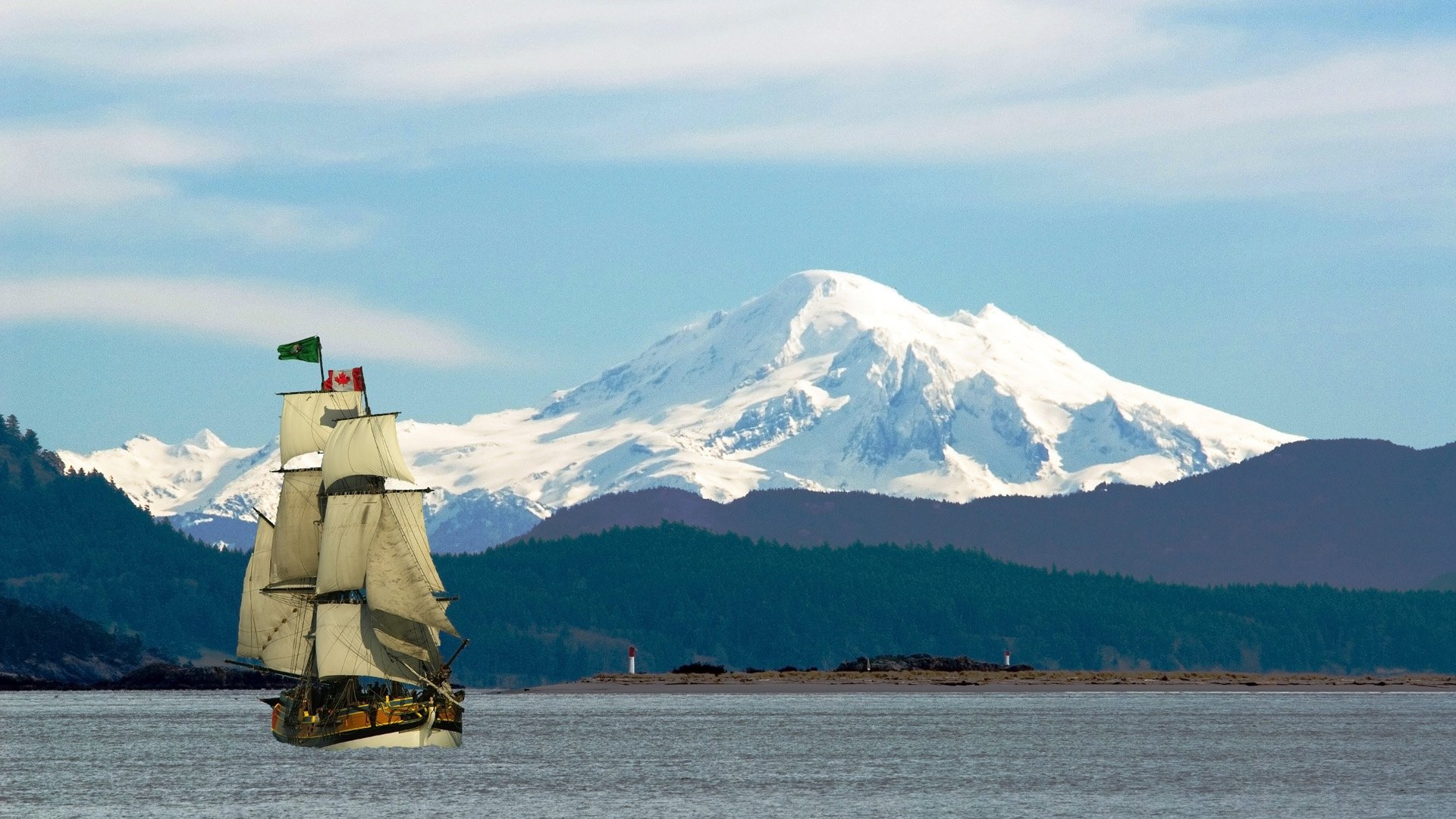 insel vancouver kanada berge schnee gipfel fluss schiff segelboot flagge