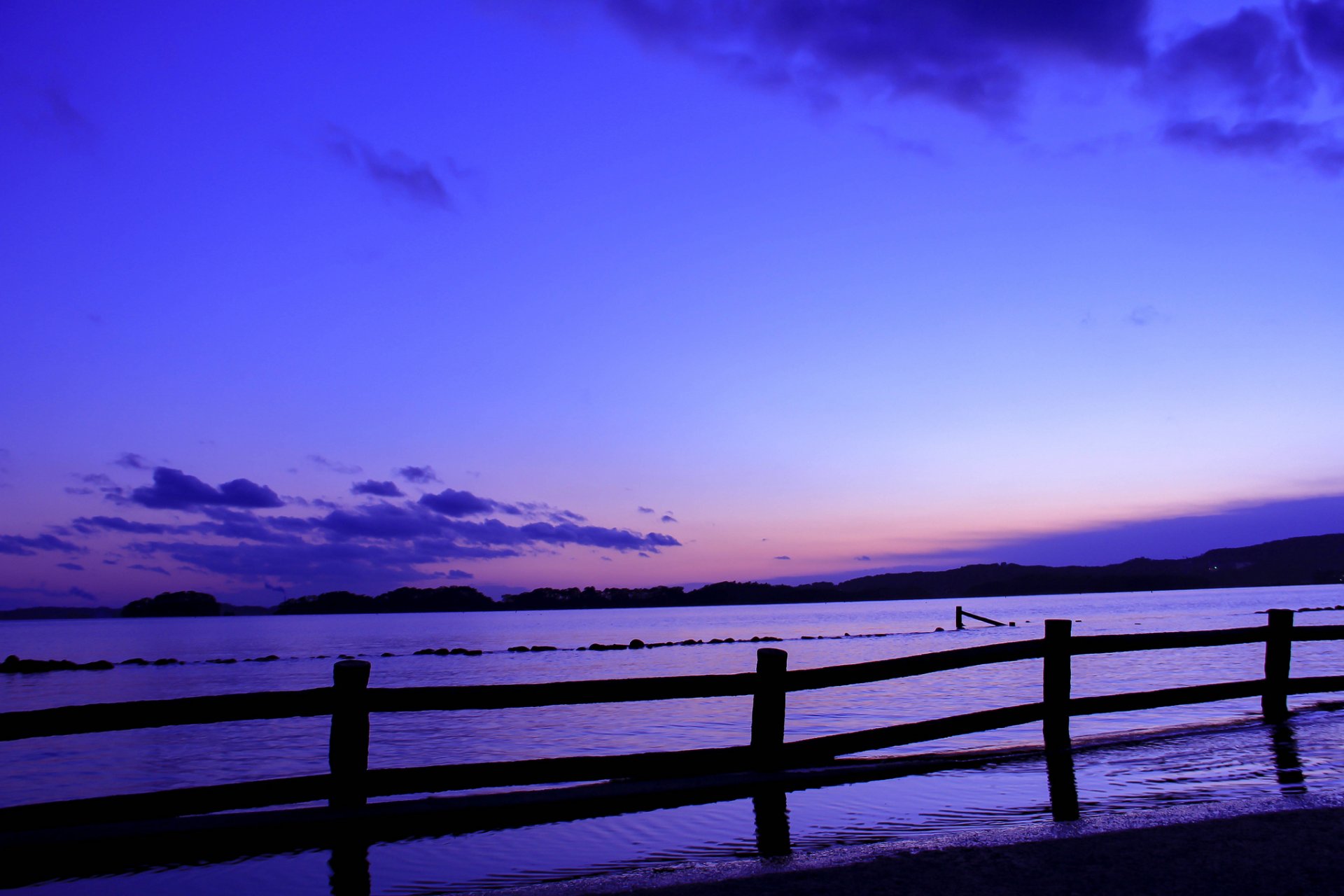 japón mar cerca esgrima tarde puesta de sol azul lila cielo nubes