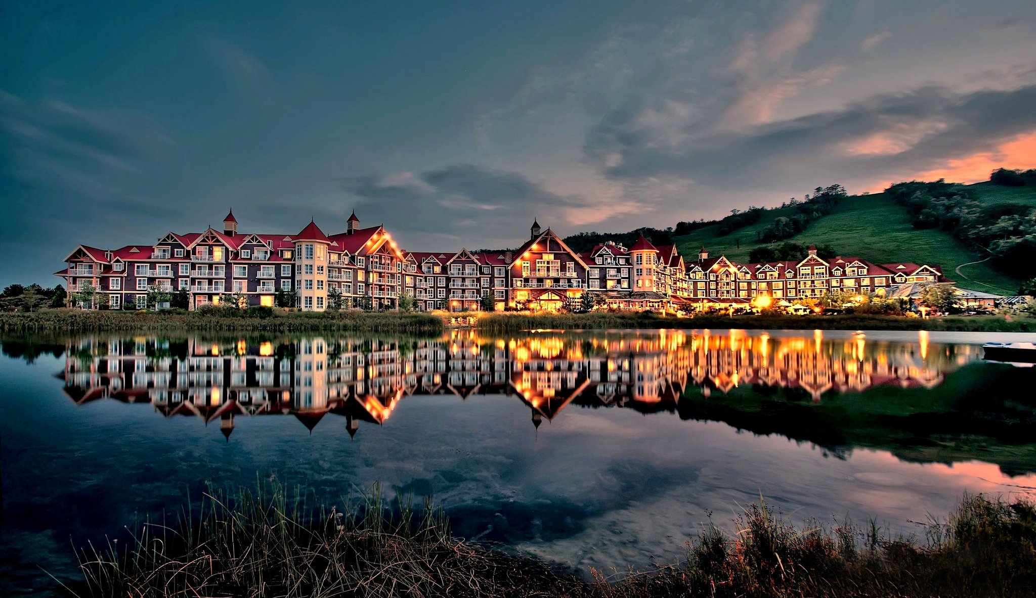 mountain slope house lake night twilight lights reflection