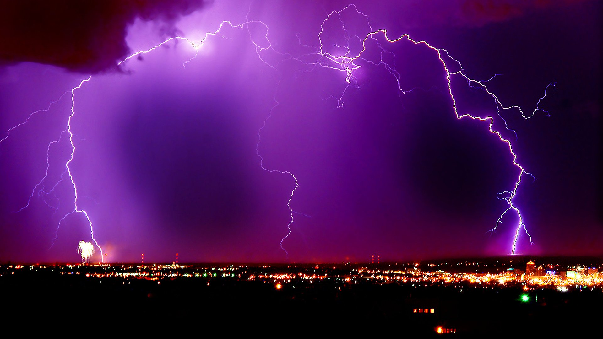 lightning night city lilac sky