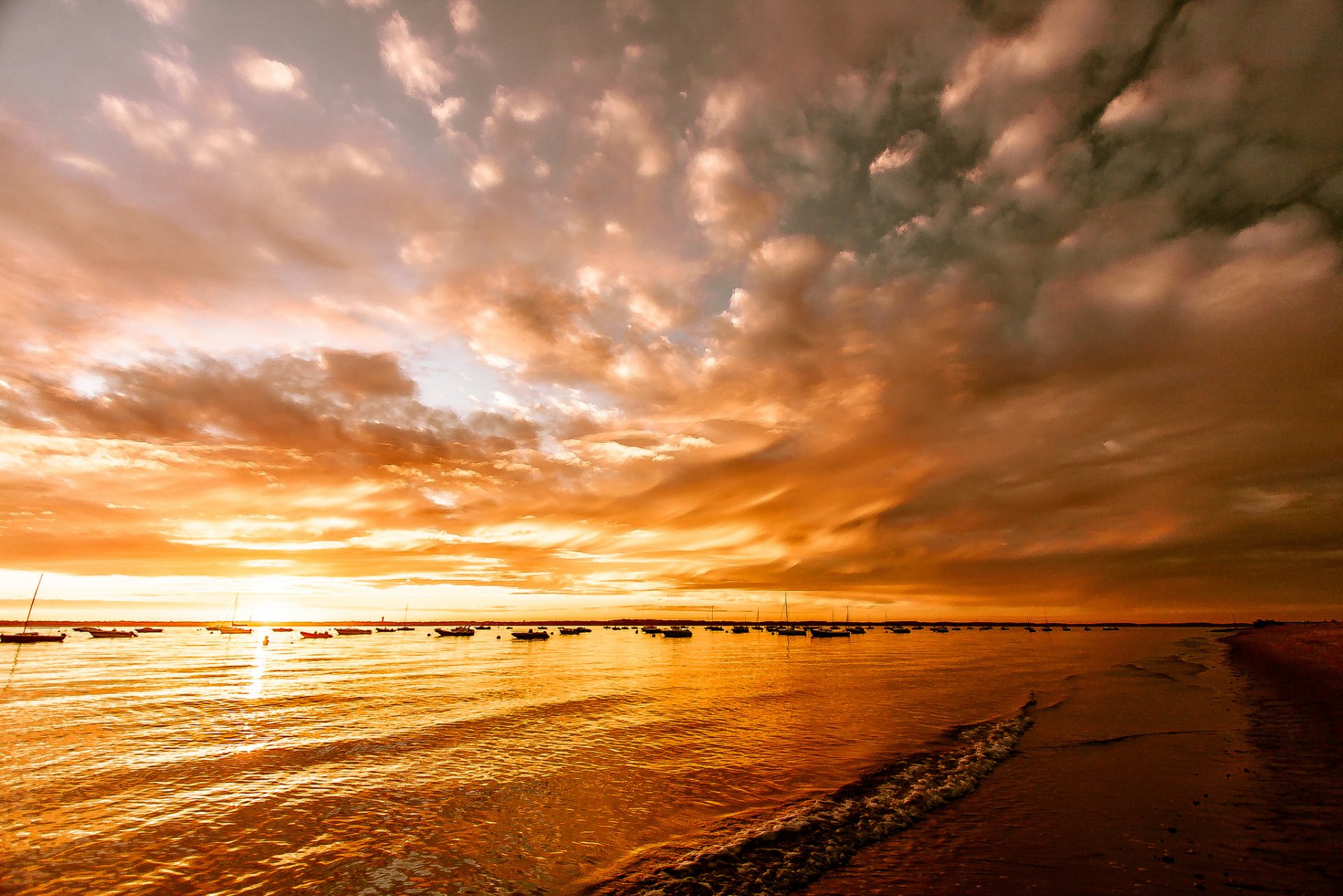 lake beach boat sunset glow