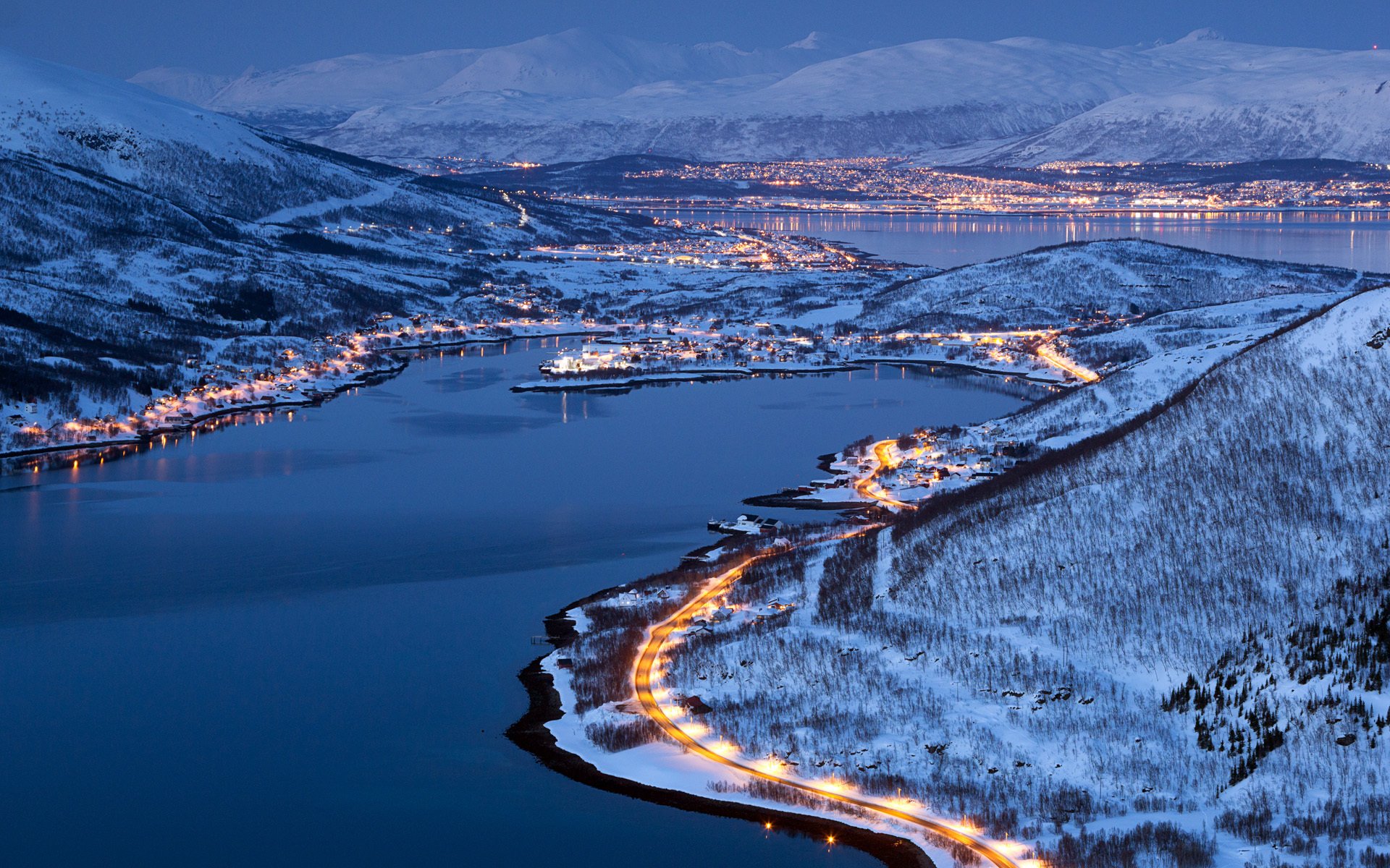 city tromsø norway lights snow winter forest mountains town tromso mountain road fjord