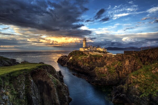 Lighthouse landscape in the middle of the ocean in Ireland