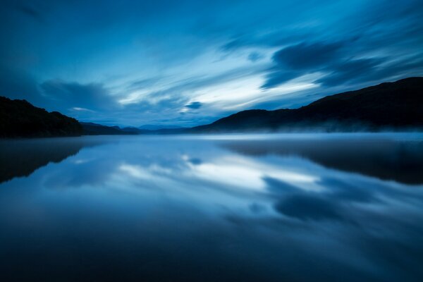 Fog on a smooth lake