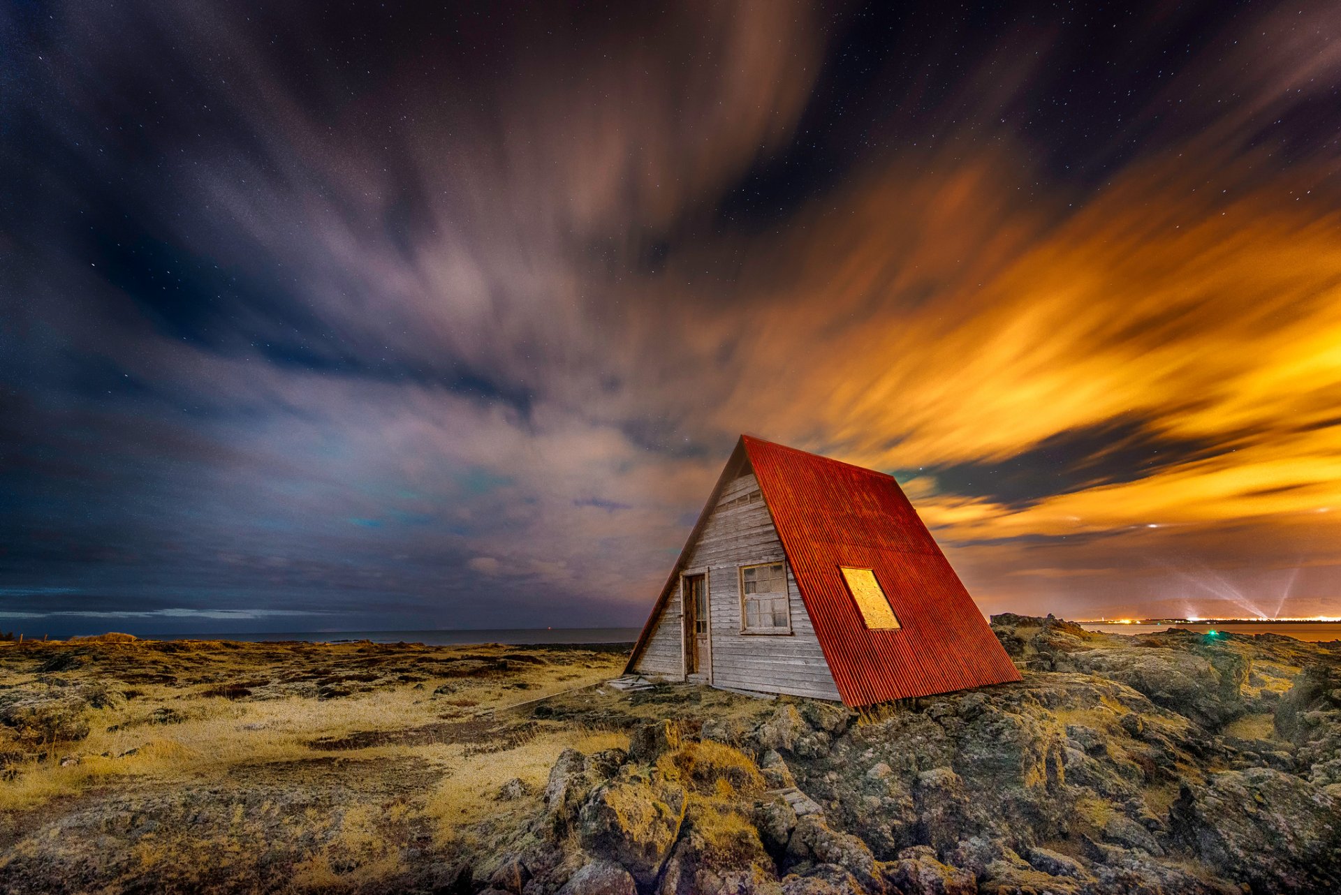 island nacht haus licht himmel sterne larry gerbrandt fotografie