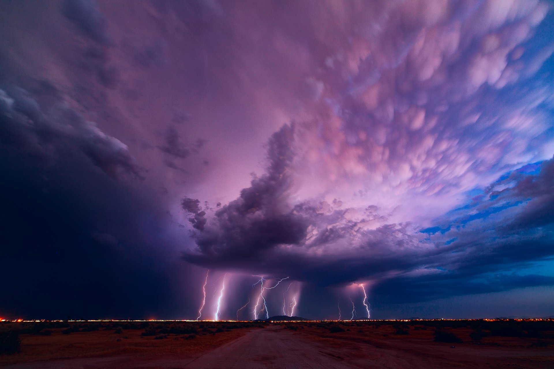 the field road sky clouds lightning