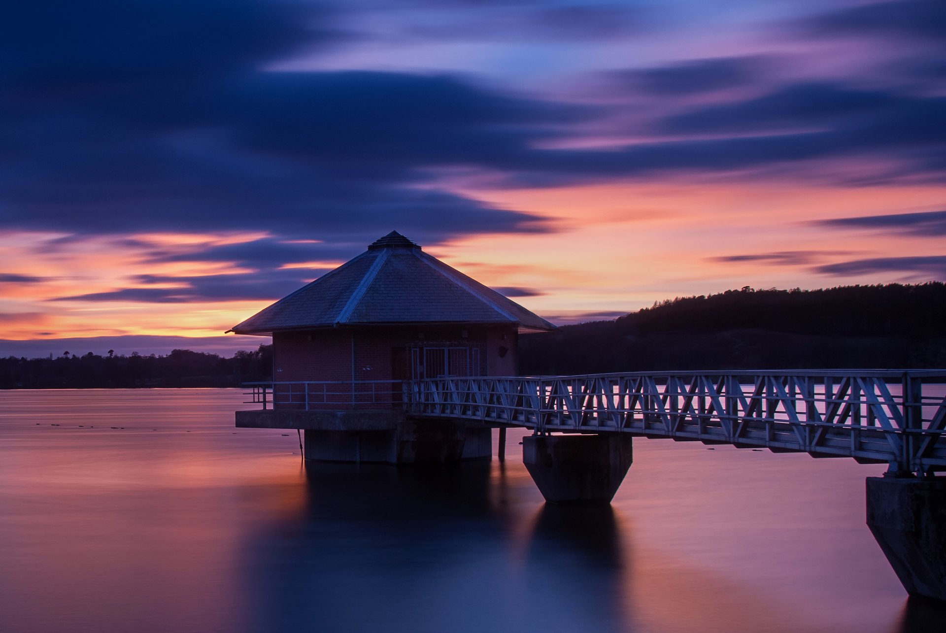 great britain england evening orange sunset lilac purple sky clouds clouds house trees bridge river silence