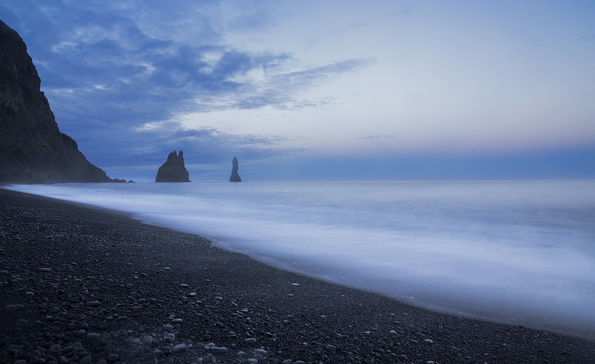 ea calm beach coast rock night blue sky cloud