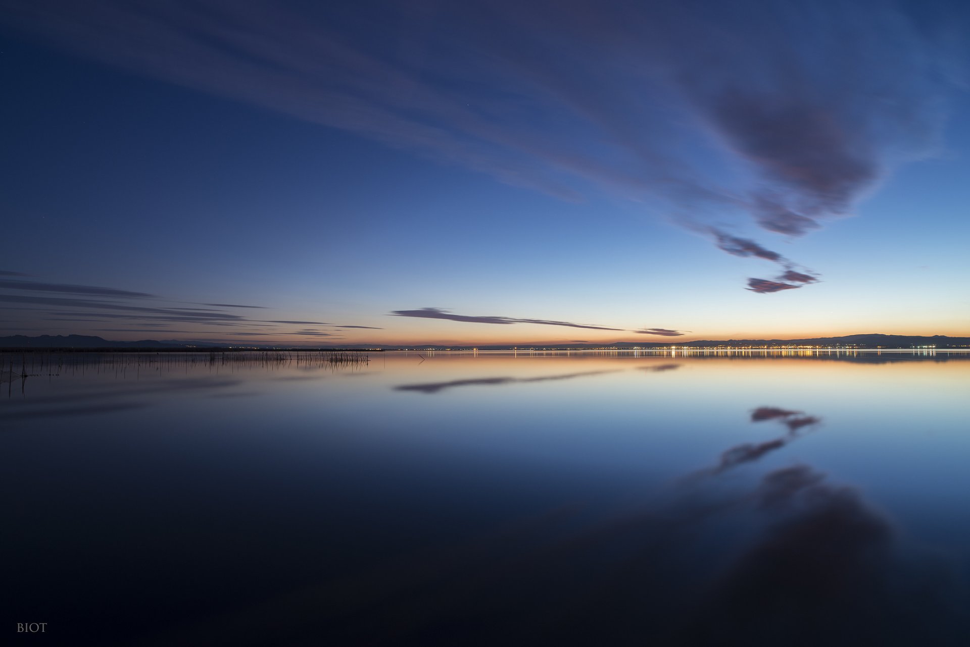 pain valencia gavines les mediterranean sea night sky clouds water reflection town lights beach alfredo biot photography