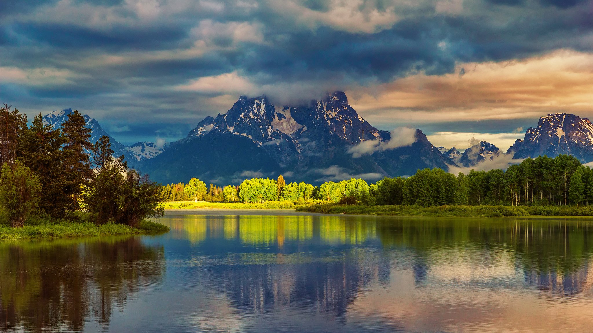 stati uniti wyoming parco nazionale grand teton backwaters bend montagne acqua foresta mattina luce riflessi nuvole estate