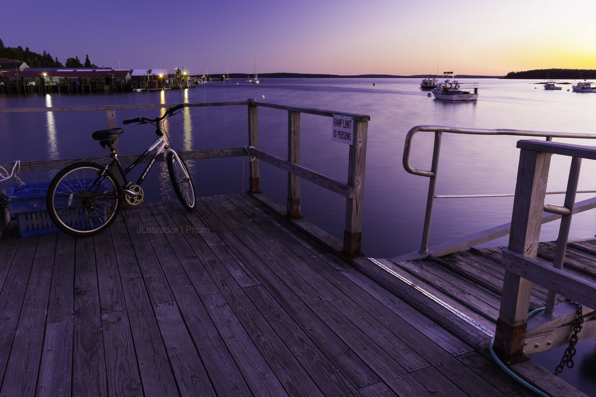 molo molo bicicletta tramonto baia