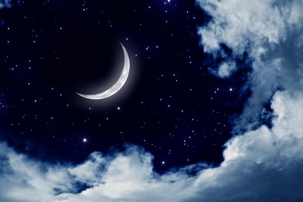 The moon and the stars with clouds in the black haze