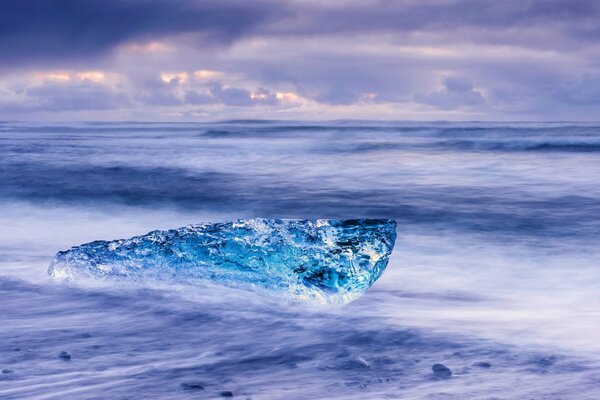 Cold winter Icelandic sea with dark cloudy sky