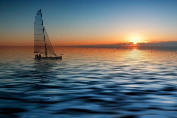 Яхта плывущая по морю на закате