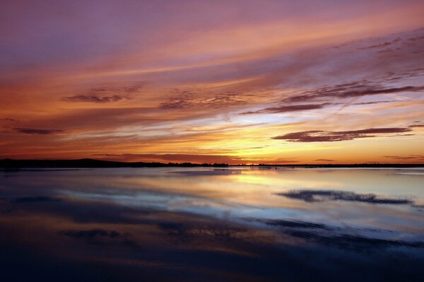 Natural beach at sunset