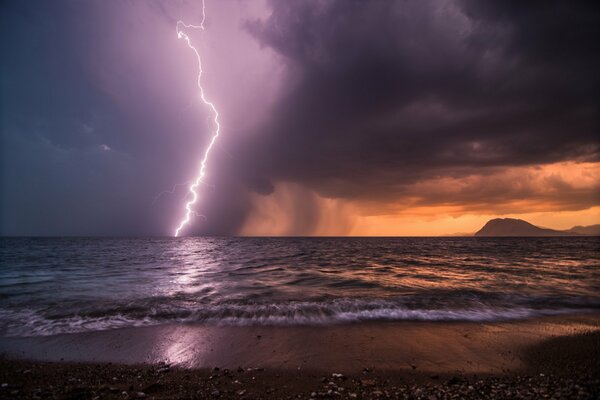 Lightning in the evening sky at sea