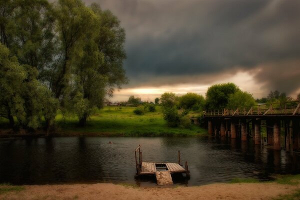 A small bridge on the shore of a reservoir