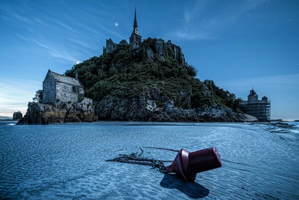 The starry night sky on the island of Mont Saint-Michel in France