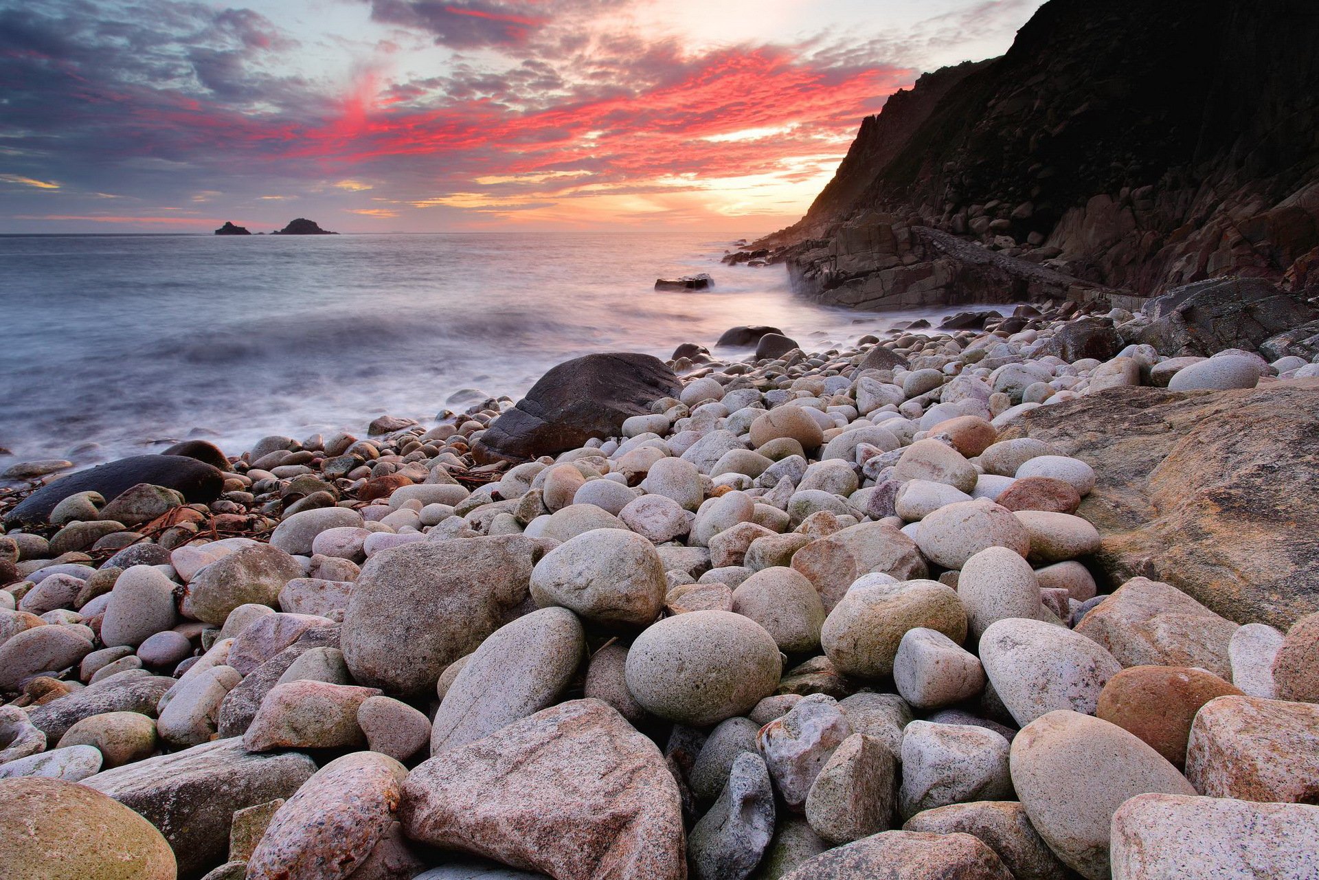 coucher de soleil mer pierres paysage