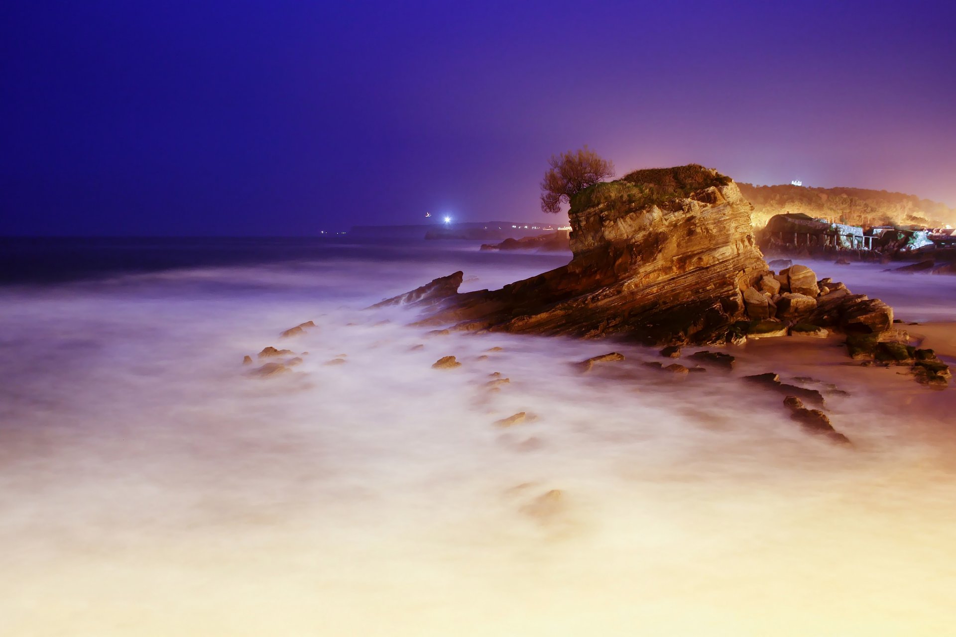 nuit mer roches exposition rétro-éclairage