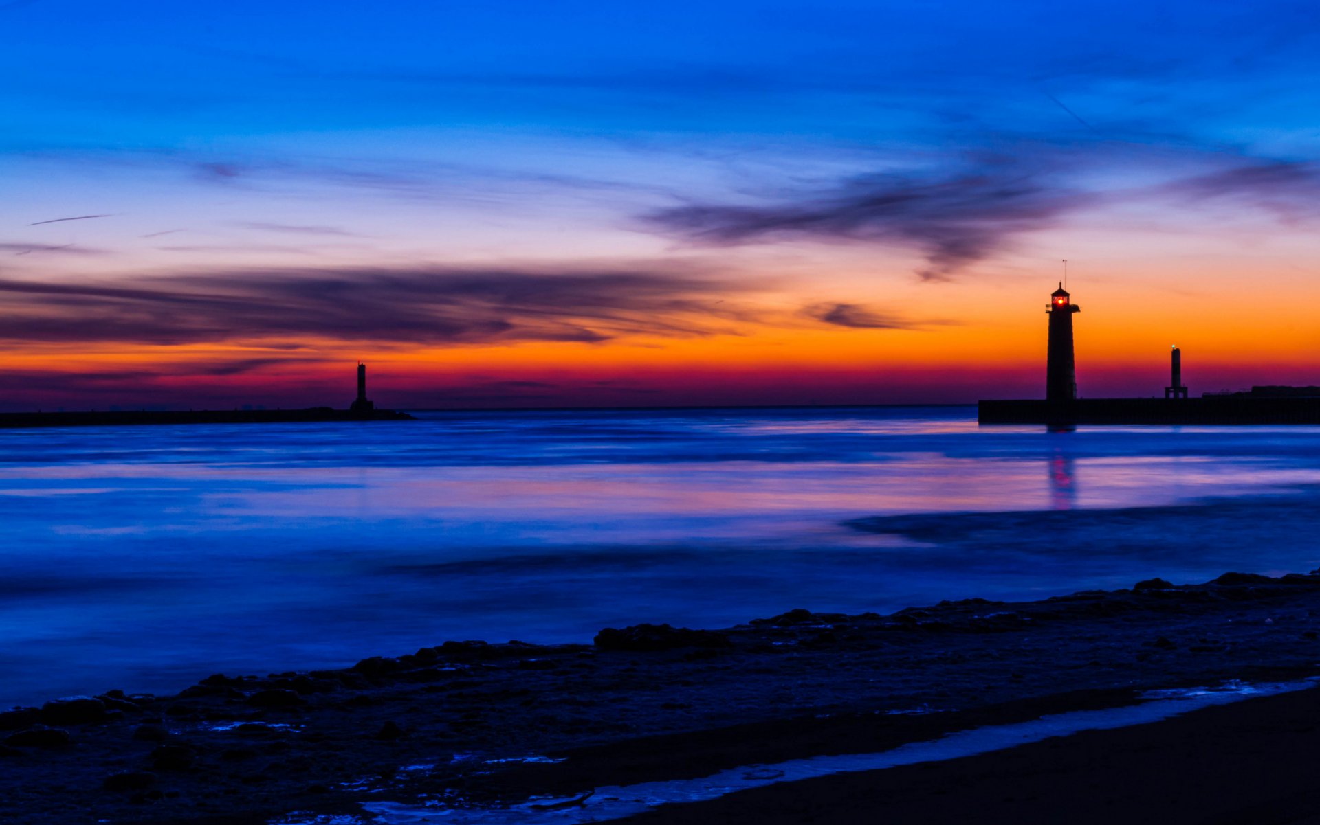 etats-unis michigan lac côte phare soirée orange coucher de soleil bleu ciel nuages