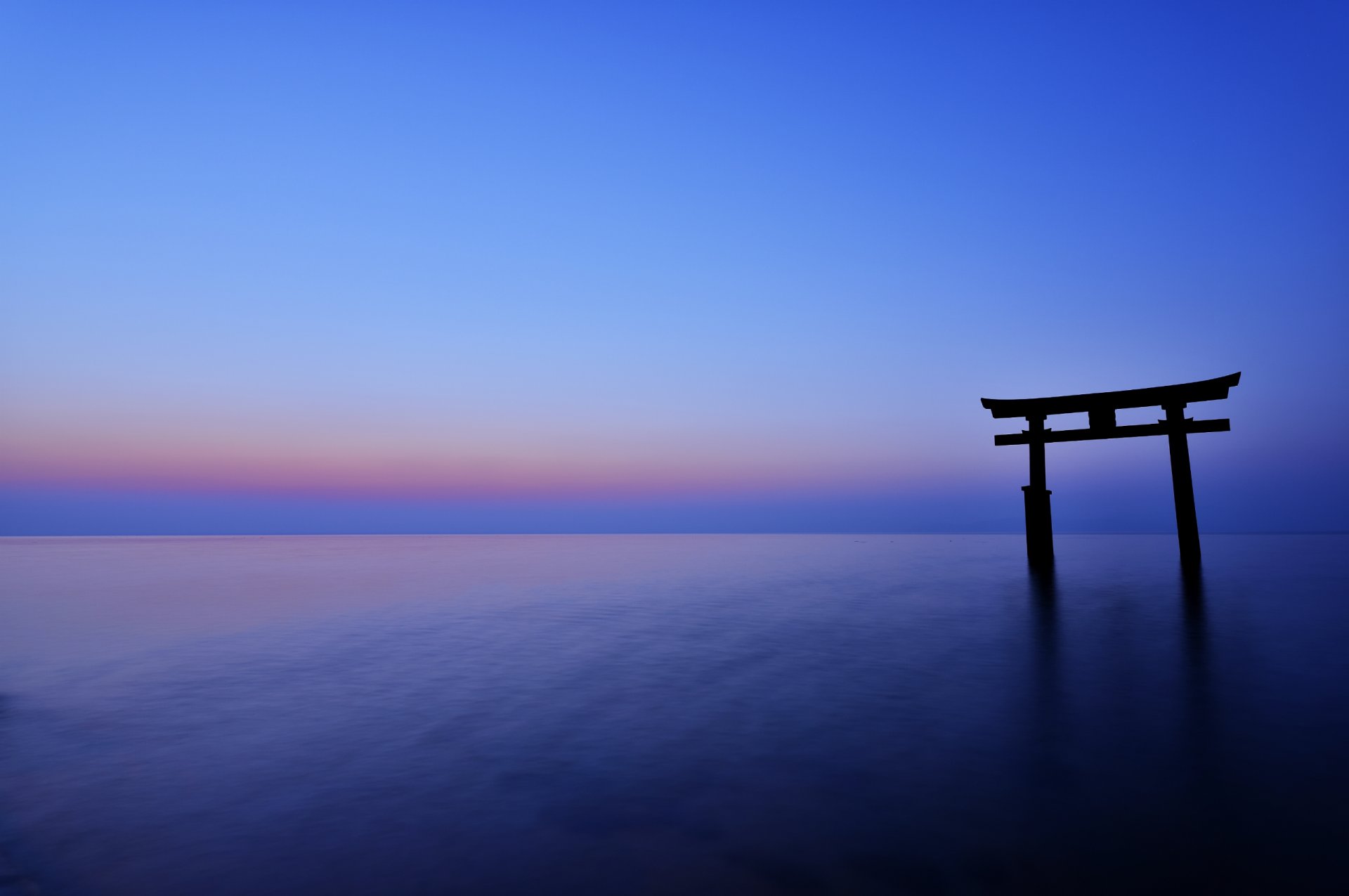 japan torii night sunset horizon sea ocean calm sky blue