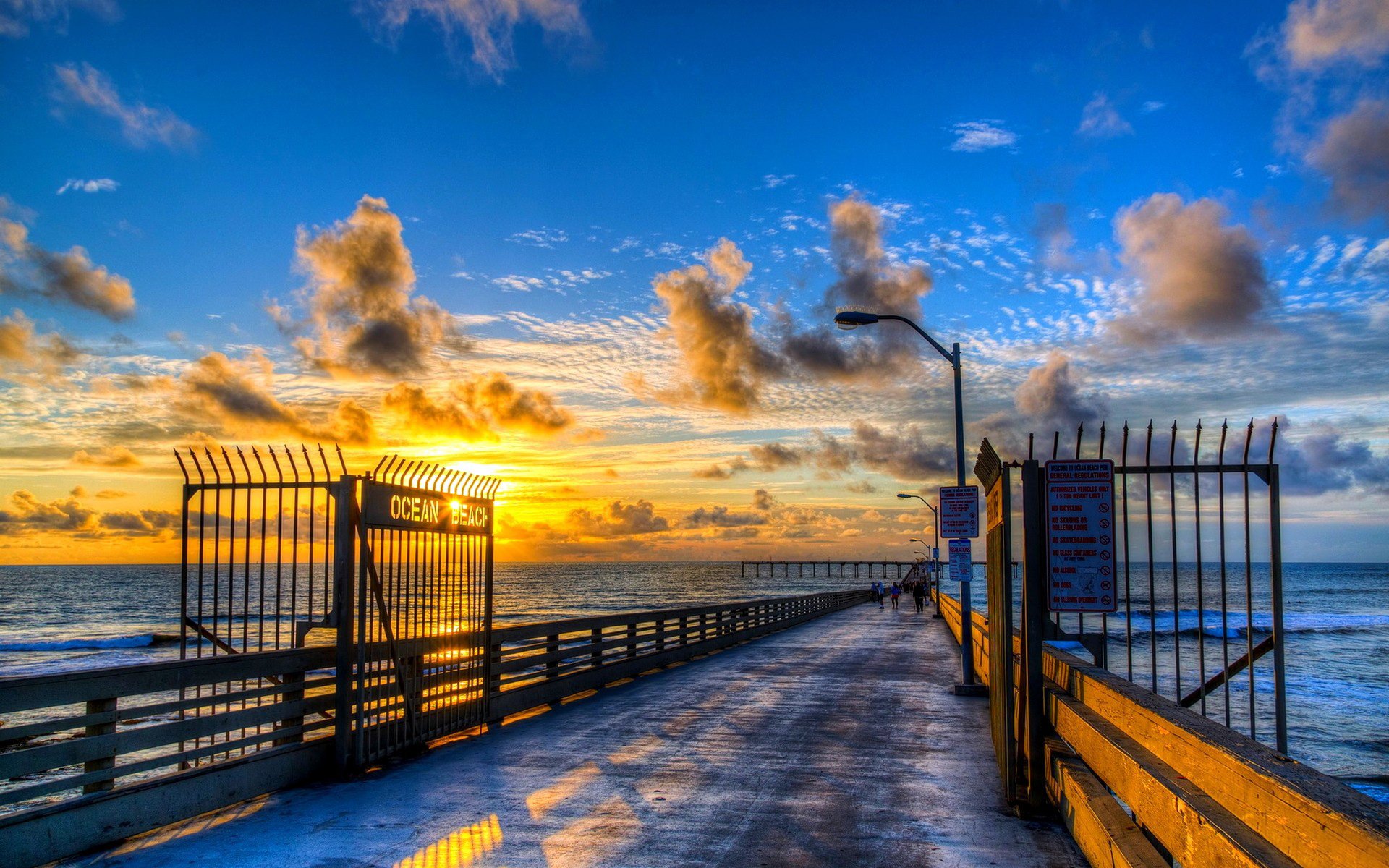 ea ocean pier pier distance horizon sky clouds sunrise sunset