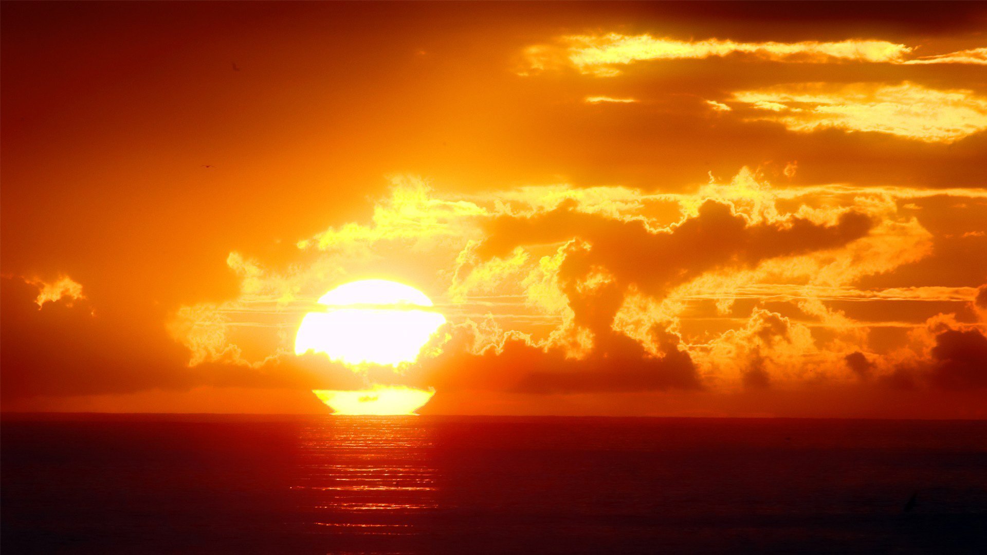 mer océan loin horizon ciel nuages soleil aube coucher de soleil