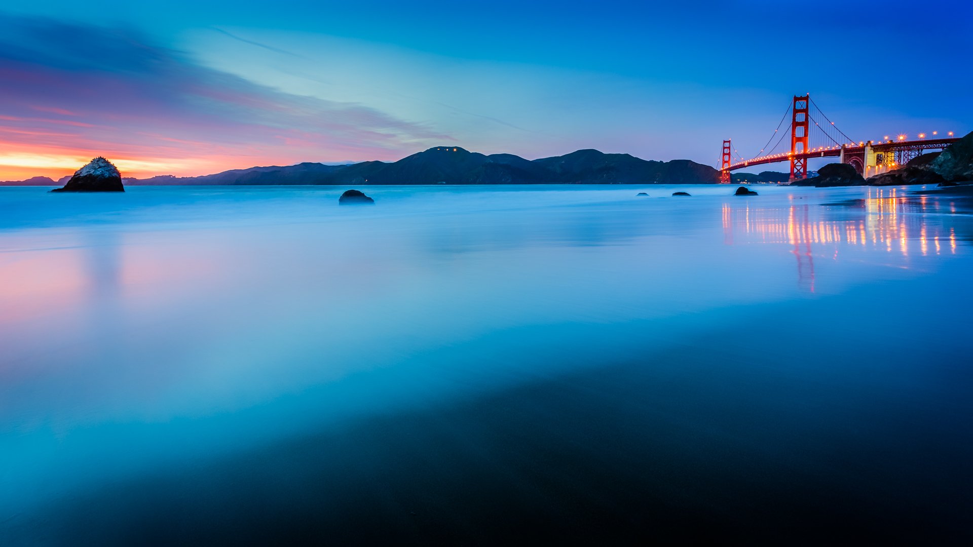 estados unidos california san francisco golden gate puente luces océano estrecho costa calma tarde puesta de sol azul turquesa cielo nubes