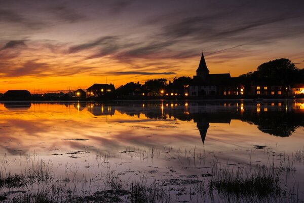 The town is drowning in the evening sunset