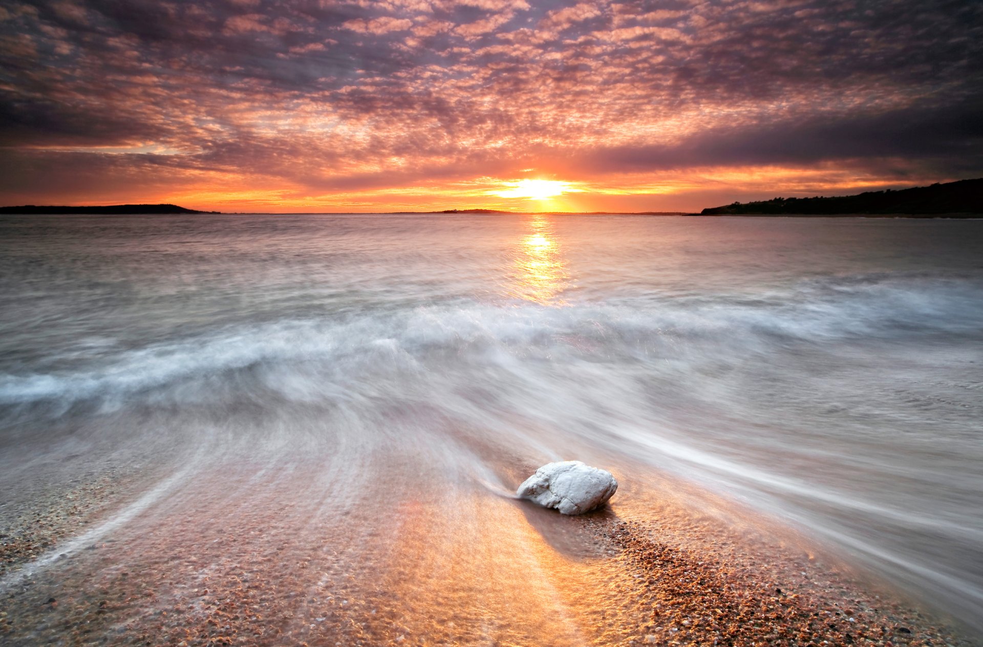 ea water flows waves extract stone stones beach sun sky sunset track brightne