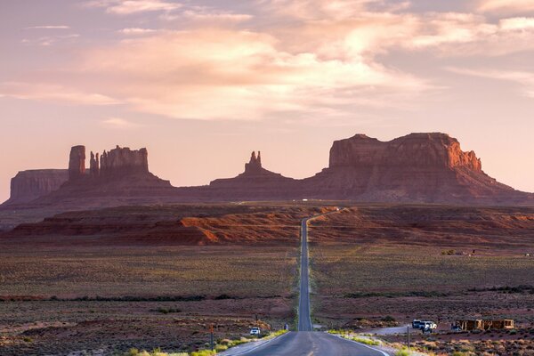 Landscape. The road in the mountains at sunset