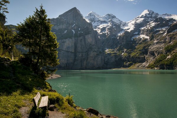 Lake among mountains and trees in Switzerland