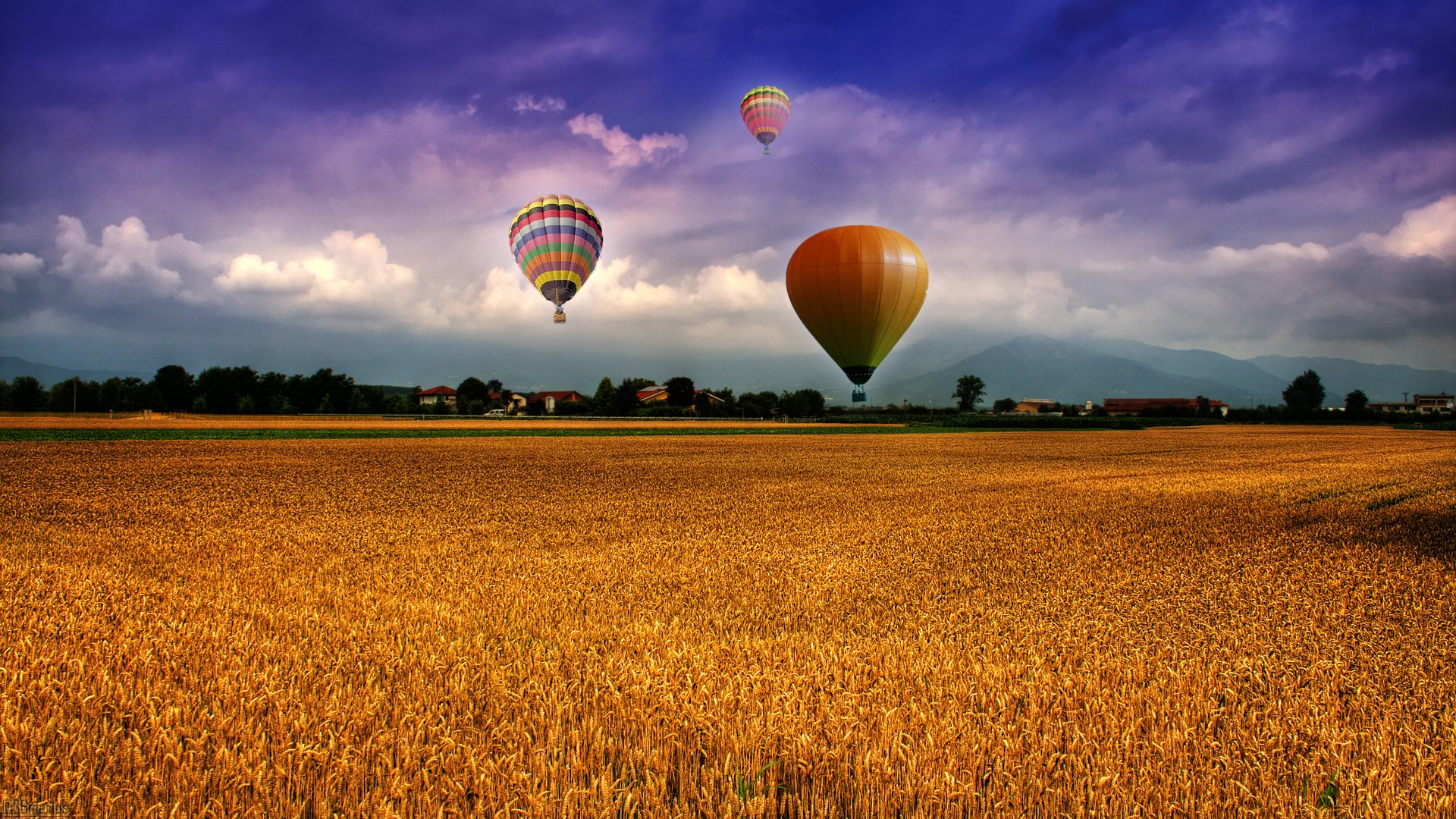 feld luftballons himmel wolken berge häuser dorf