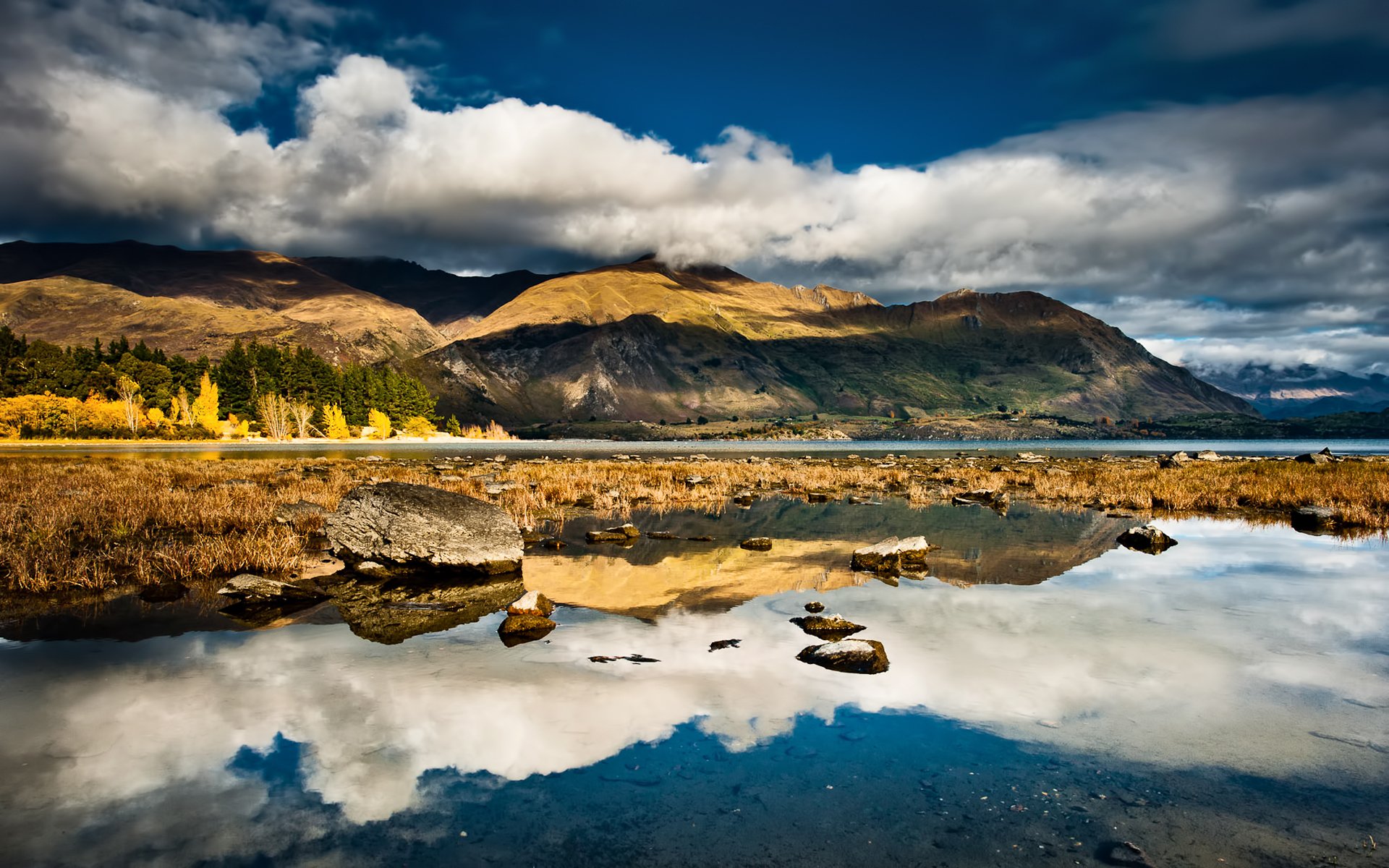 nouvelle-zélande montagnes pierres lac réflexion nuages ciel