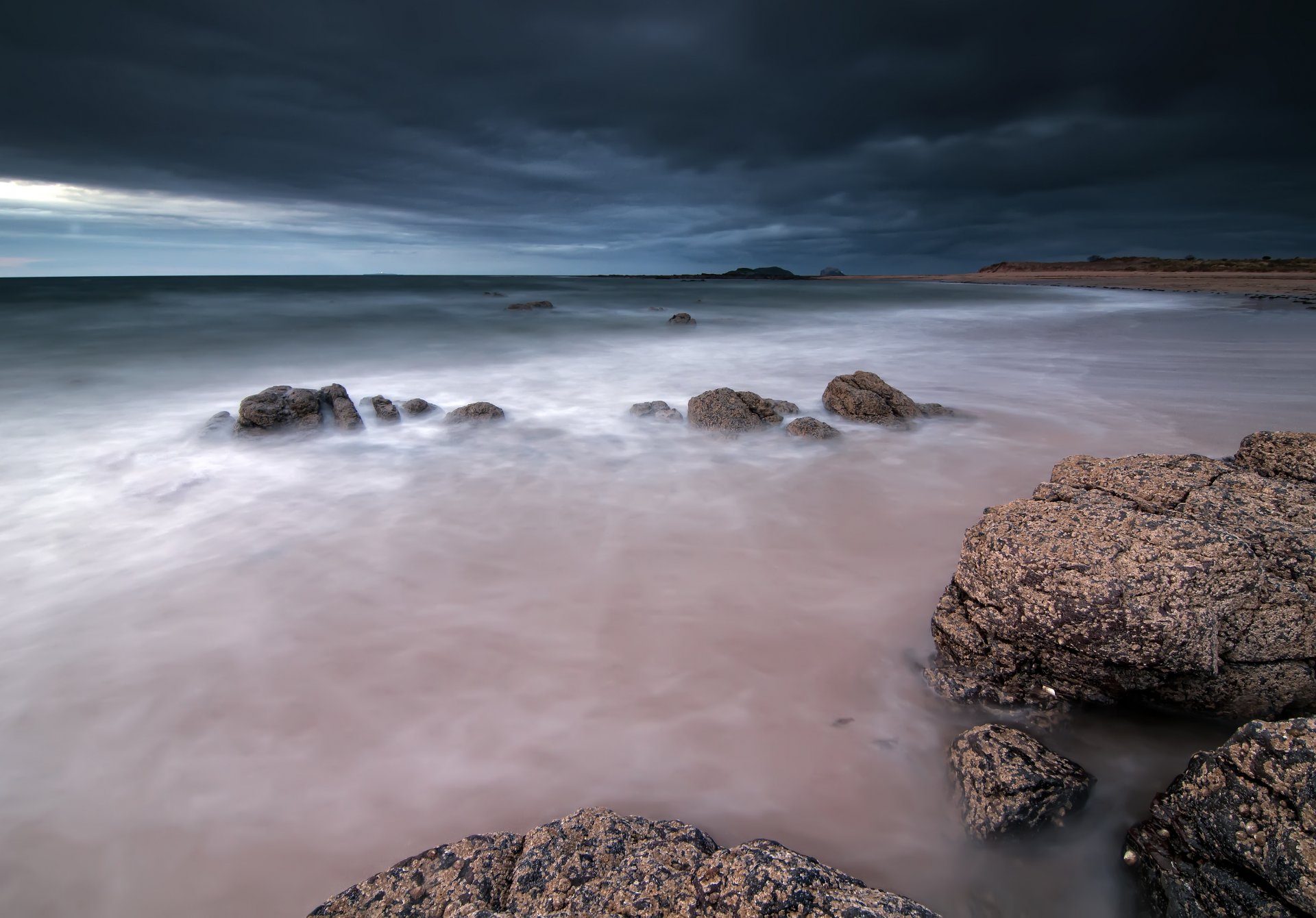 united kingdom scotland night sky clouds sea stones beach