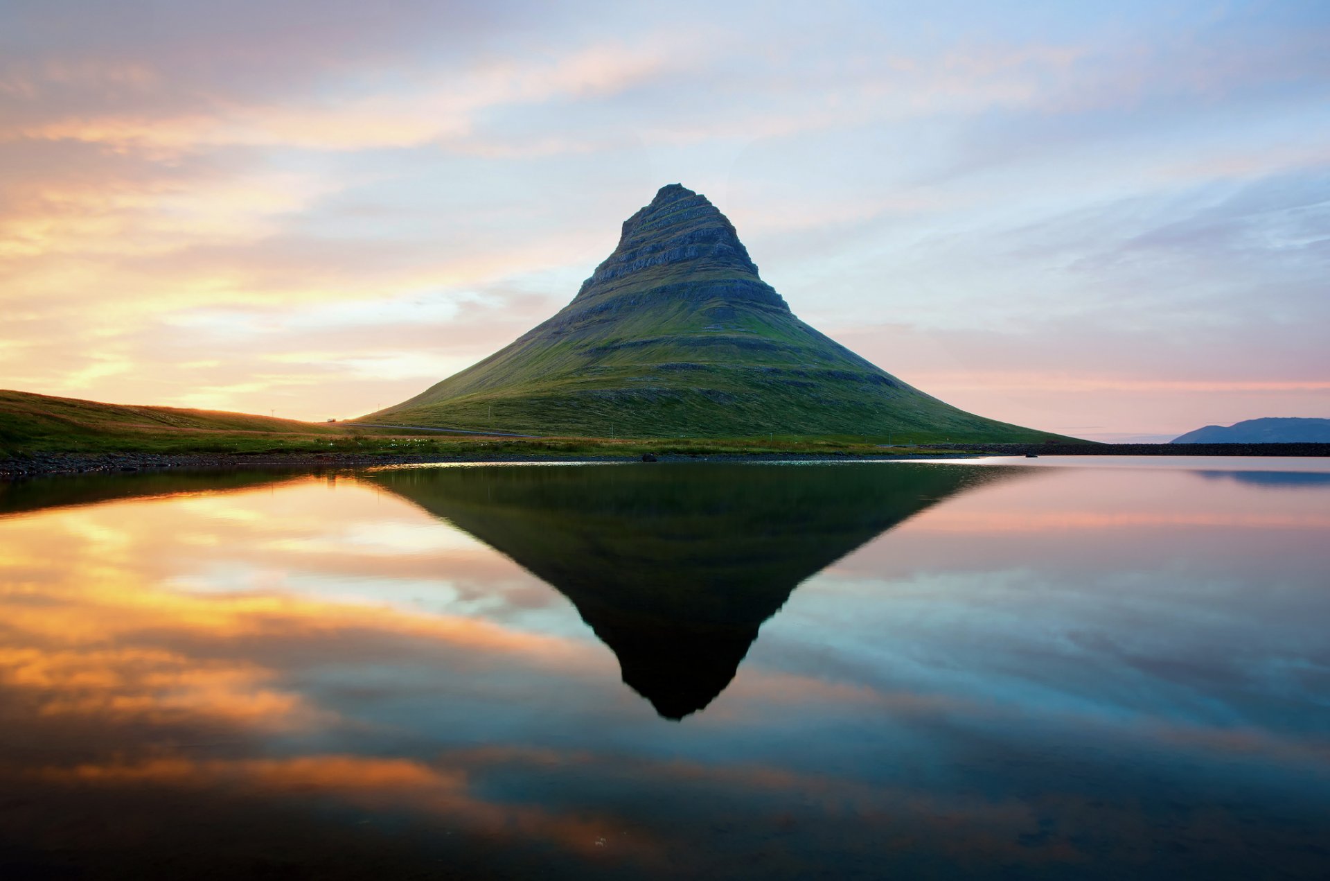 iceland an extinct volcano mountain kirkjufell scandinavia water reflection sky sunset