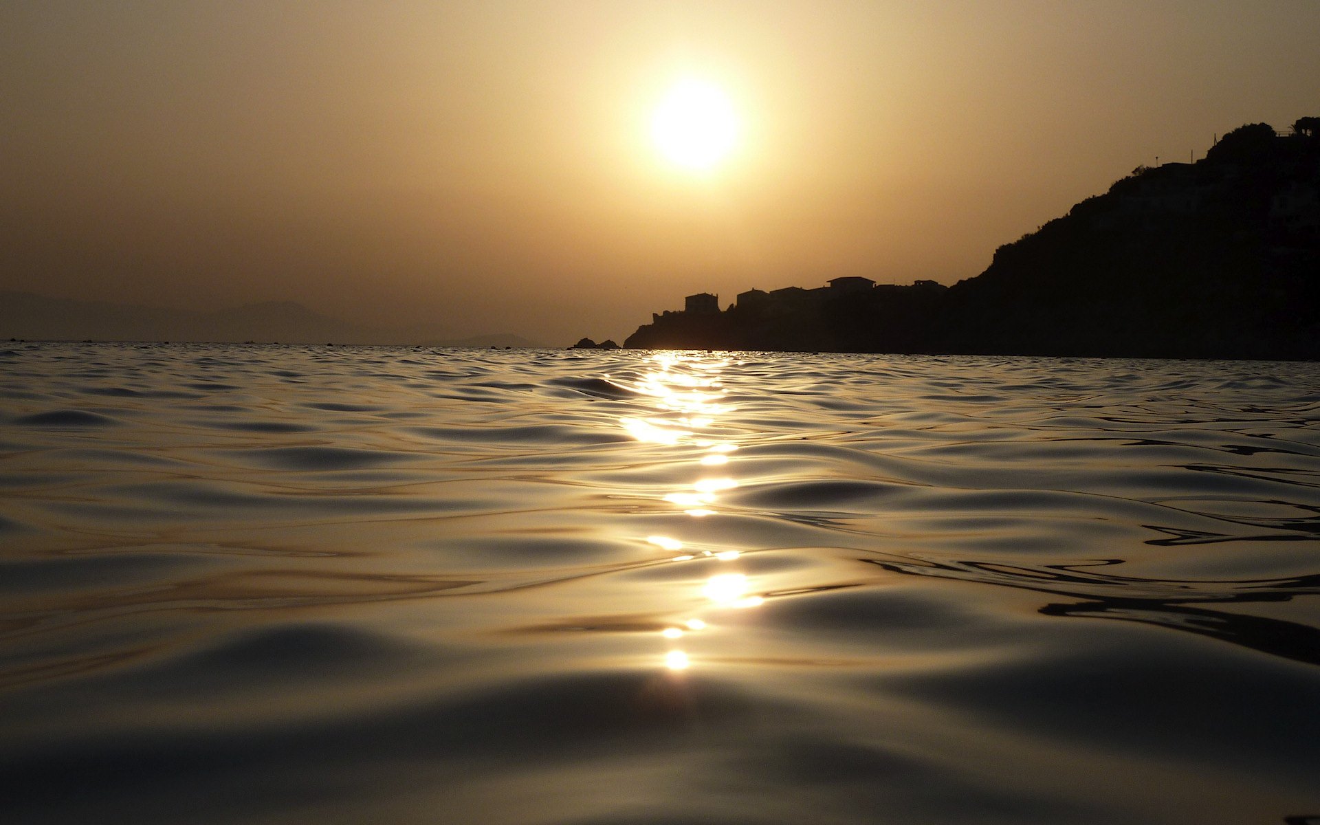 mattina mare costa sole foschia alba