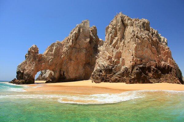 The arch in the rock is just a miracle of nature