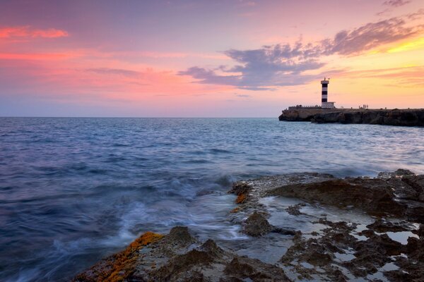 Beautiful view of the lighthouse at sunset