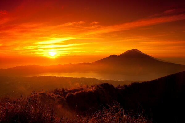 Orange sunset enveloping the mountains