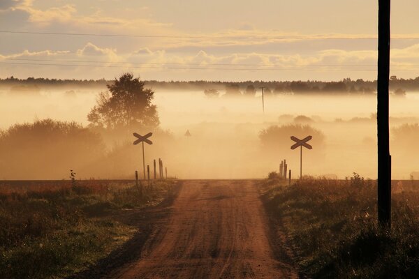 Rural road in fog. Before moving