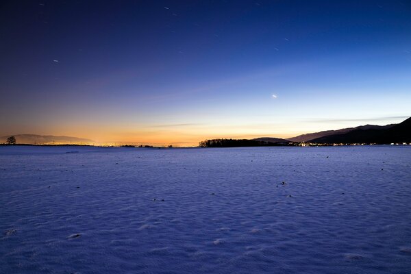 Winter landscape. Sunset on a sunny day