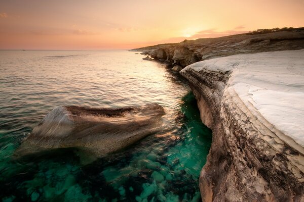 Orange sunset on the shores of Cyprus