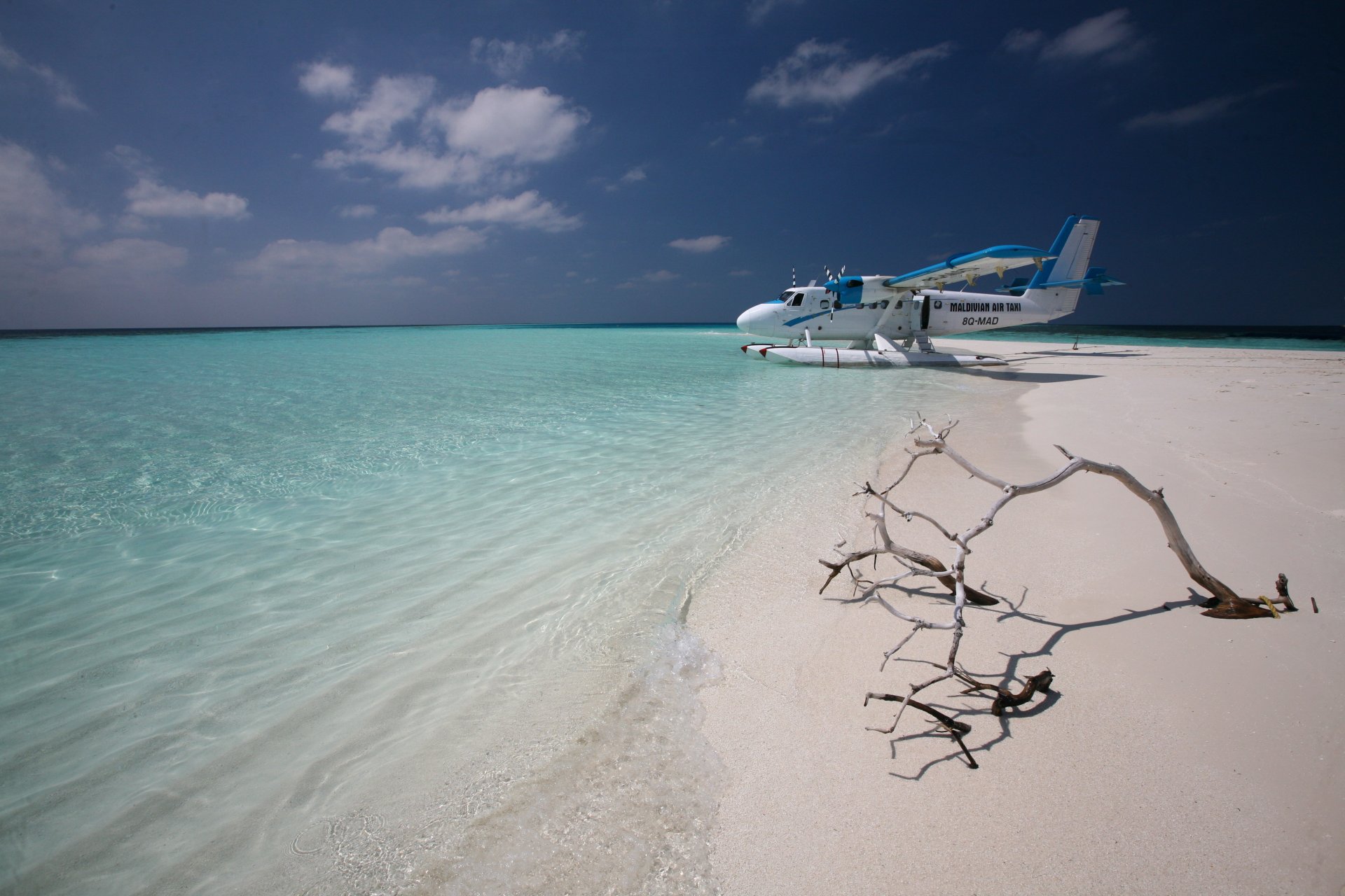 the maldives taxi plane ocean sand island horizon