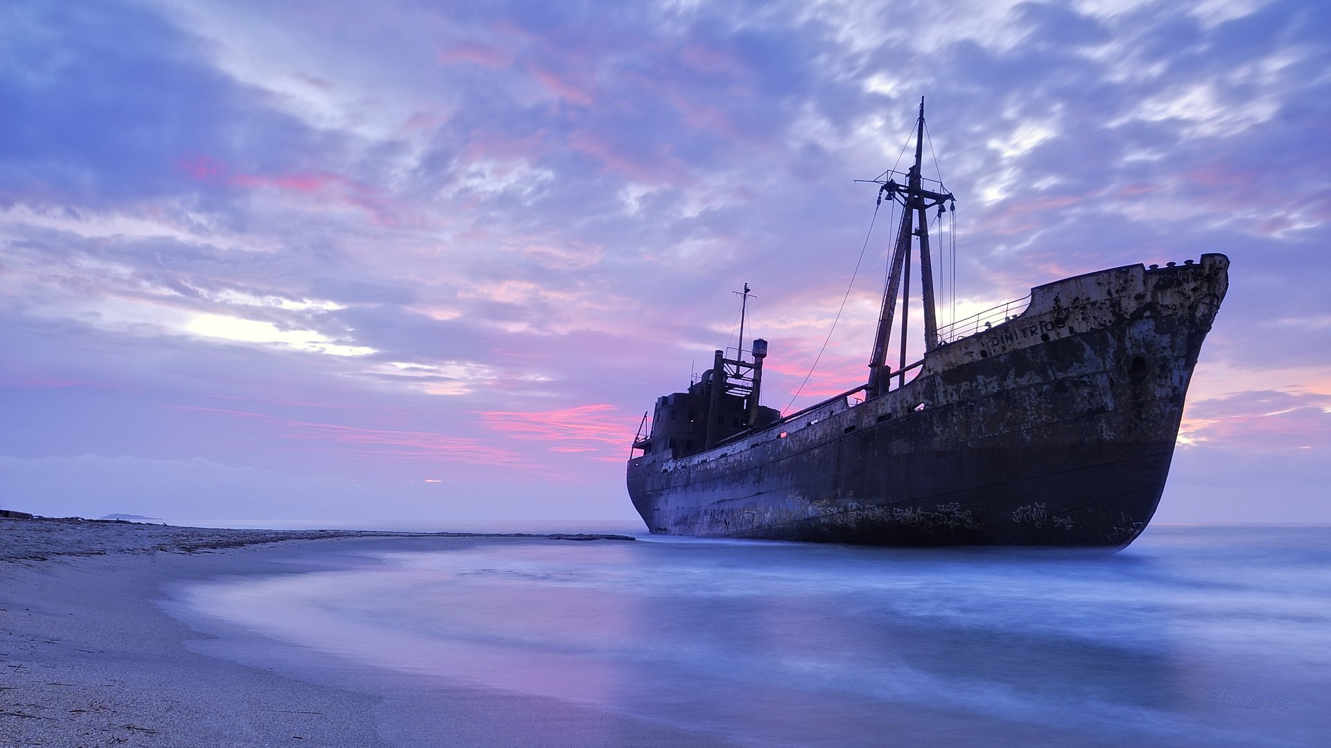 hip sea shore beach sand sky evening ship horizon